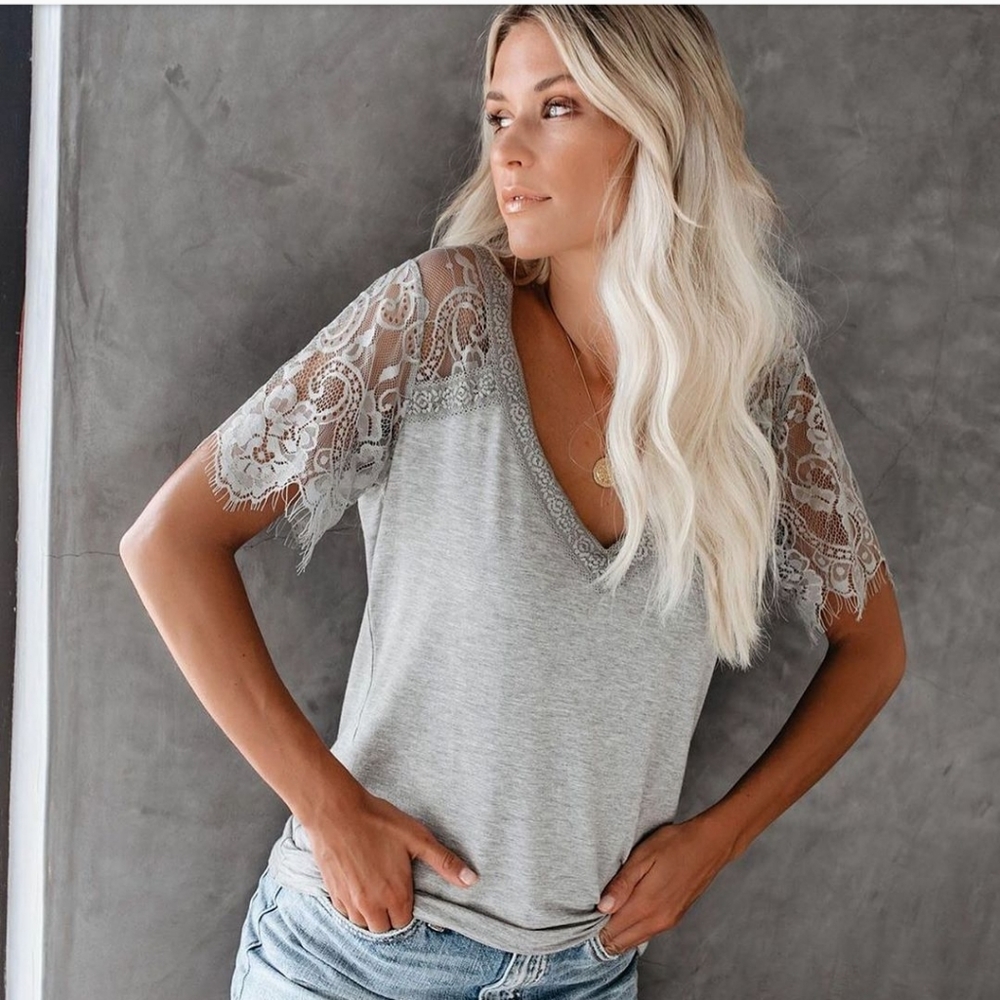 Olive green V neck T shirt with lace sleeves.